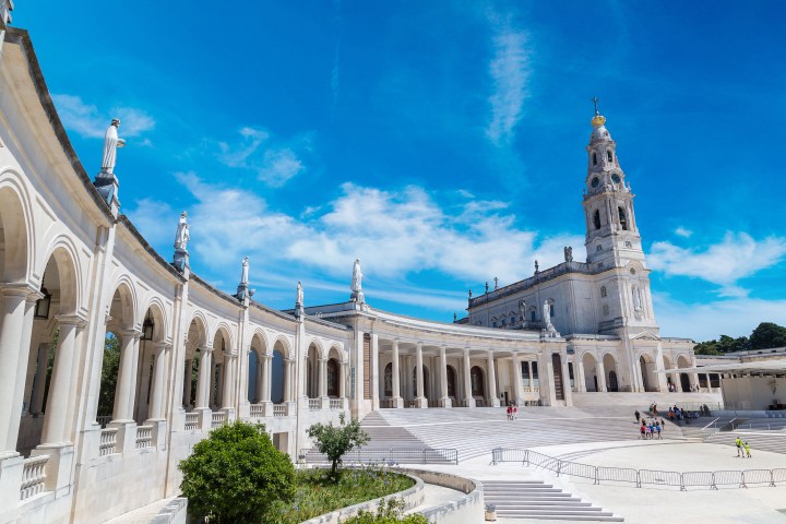 a large stone building with a clock tower