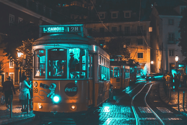 a group of people sitting at night