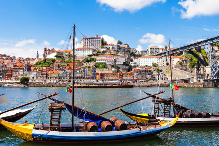 a boat is docked next to a body of water